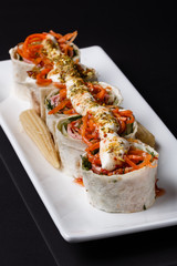 Rolls with pita and ham on white plate