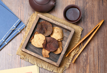 chinese dried tangerine peel in wooden box with tea