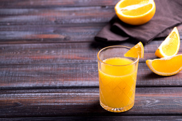 Fresh orange juice on the table,  rustic style
