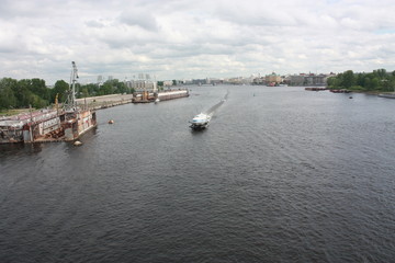 view from the bridge to the Neva river and boats of St. Petersburg   