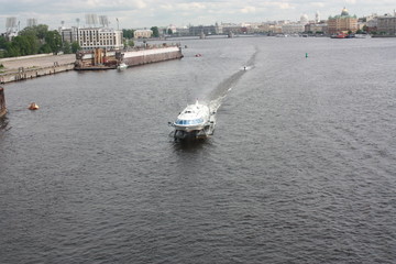view from the bridge to the Neva river and boats of St. Petersburg   