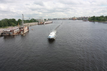view from the bridge to the Neva river and boats of St. Petersburg   