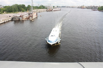view from the bridge to the Neva river and boats of St. Petersburg   