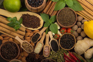 various spices on wooden background