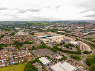 Aerial photo over looking the whole of Leeds from the Beeston area of the City Centre in West Yorkshire, the photo also shows the Elland Road Leeds United football stadium in the background. © Duncan