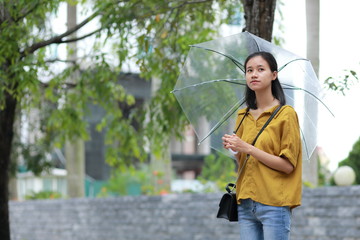 woman with umbrella in town
