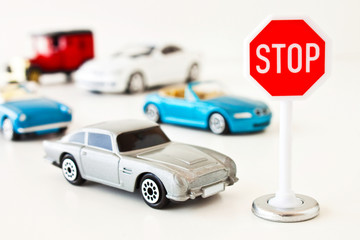 Model cars and stop traffic sign