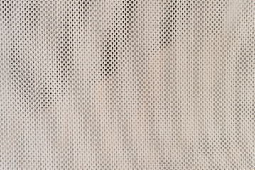 light mesh. Crumpled light background from a fine grid. Small squares.