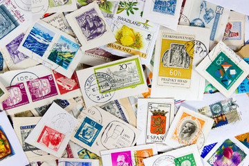 Fototapeta na wymiar Used vintage stamp collection. Concept of philately hobby
