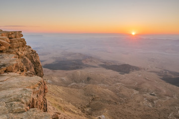 Fototapeta na wymiar Sunrise in the Negev desert. Makhtesh Ramon Crater in Israel 