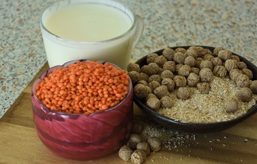 healthy food and drinks, kefir, bran, balls and cereals of red lentils