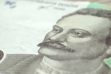 Fragment of twenty hryvnia bills closeup. Shallow depth of field