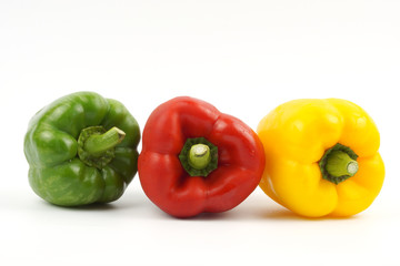 Fresh vegetables Three sweet Red, Yellow, Green Peppers on white background