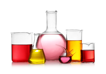 Set of different lab glassware with color liquid isolated on white