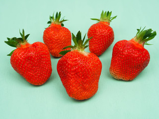 juicy strawberries on a light background