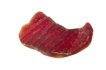 slice of dried chicken carpaccio isolated on white background