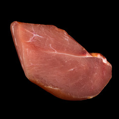 slice of dried chicken isolated on black background
