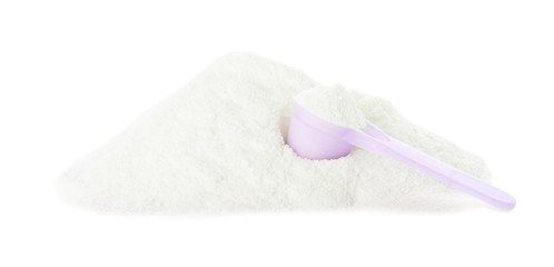 Pile of protein powder with scoop on white background