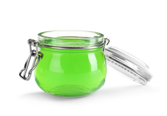 Tasty colorful jelly in glass jar on white background