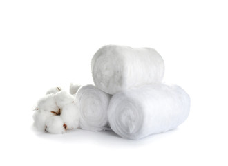 Fototapeta na wymiar Fluffy cotton rolls and flower on white background