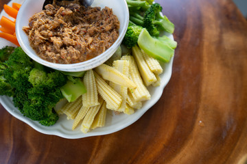 Fried mackerel with shrimp-paste sauce and many kinds of vegetable. Thai food concept.