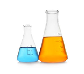 Chemistry glassware with color samples isolated on white