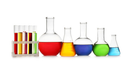 Chemistry glassware with color samples isolated on white