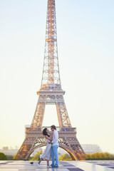 Happy romantic couple in Paris, near the Eiffel tower