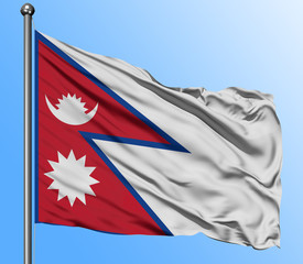 Nepal flag waving in the deep blue sky background. Isolated national flag. Macro view shot.