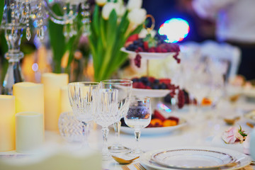 Beautiful table set with candles and flowers