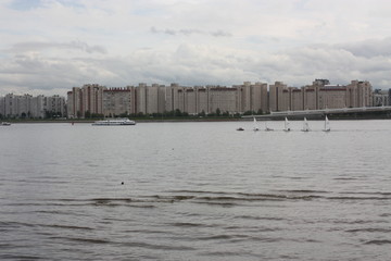 a view of the river, boats and buildings  