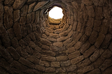 Deep ancient well inside