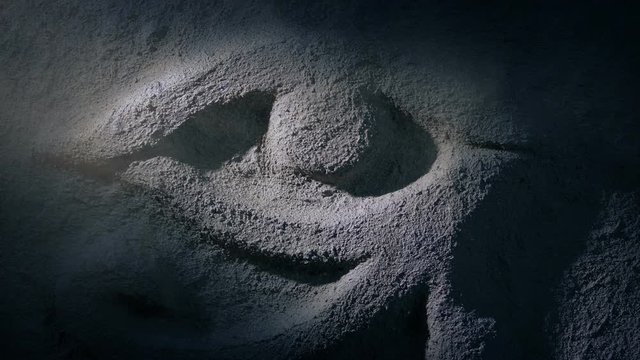 Torch Shines On Egyptian Eye Rock Carving