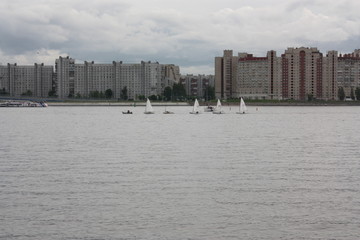 a view of the river, boats and buildings  