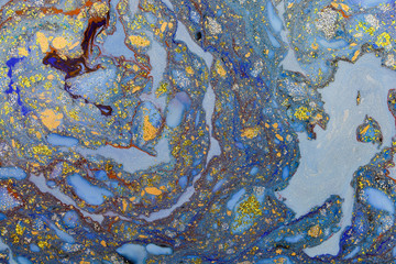 Beautiful abstract painting is a painting technique Ebru .Turkish Ebru style on the water with acrylic paints wring wave.Stylish combination of luxury.Contemporary art marble liquid texture 