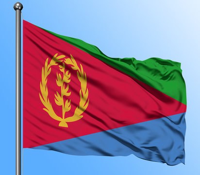 Eritrea flag waving in the deep blue sky background. Isolated national flag. Macro view shot.