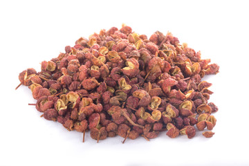 heap of sichuan pepper isolated on white background