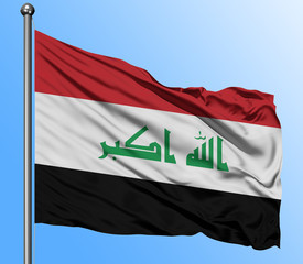 Naklejka na ściany i meble Iraq flag waving in the deep blue sky background. Isolated national flag. Macro view shot.