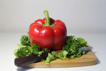 fresh pepper vegetables on wooden board
