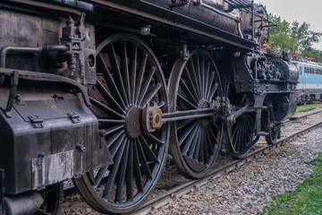 Fototapeta na wymiar big wheels on a steam train