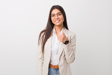 Young business arab woman isolated against a white background smiling and raising thumb up