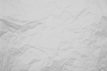 Paper crumpled white background. Abstract texture wallpaper.