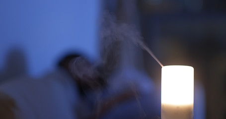 Air diffuser light at home in the evening