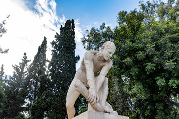 wood crusher statue in Athens