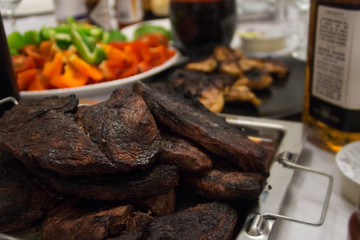 Home made barbecue and vegetables on the table