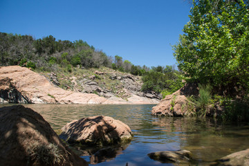 Fototapeta na wymiar Rocks of Colorado river in Inks Lake State Park, Texas