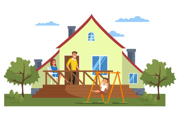 Obraz na płótnie Canvas Happy modern family in front of house
