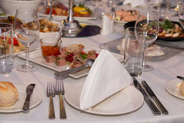 beautifully served dinner table for friends on the anniversary of the highest class
