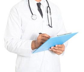 Close up of male medicine doctor writing on clipboard. Medical and healthcare concept