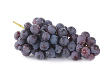 bunch of blue grapes isolated on white
